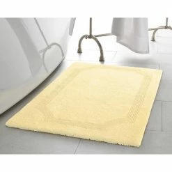 Brand new 🤩 Discount ✔️ Solid Reversible Yellow 21 in. x 34 in. Bath Mat by Laura Ashley ⭐ 🔔 -Becky Cameron Shop yellow laura ashley bathroom rugs bath mats laymb005973 31 1000